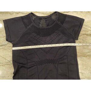 Athleta: Short sleeve, black, Size M, top with bottom grippers.